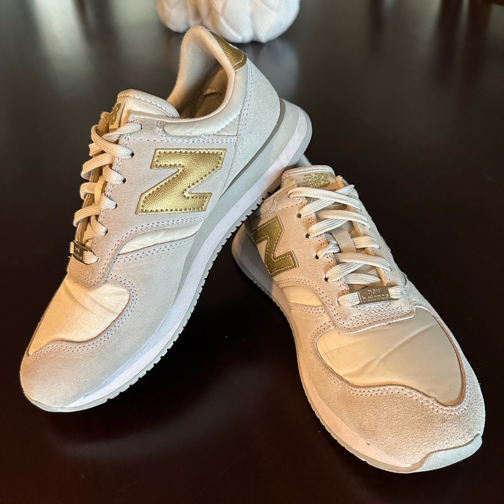 New Balance Beige and Gold Athletic Shoes